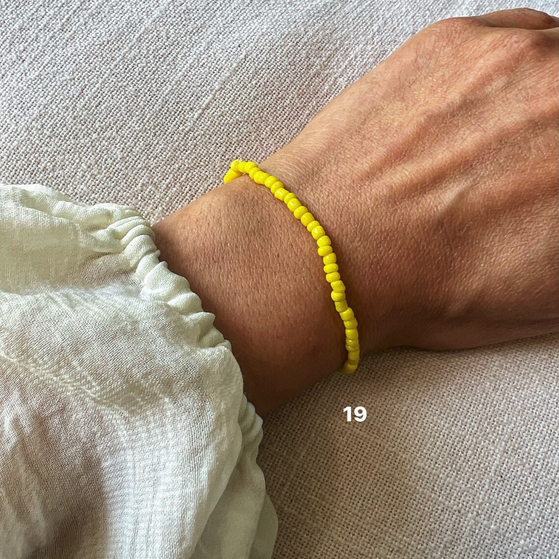 bracelets élastique perles couleurs unies